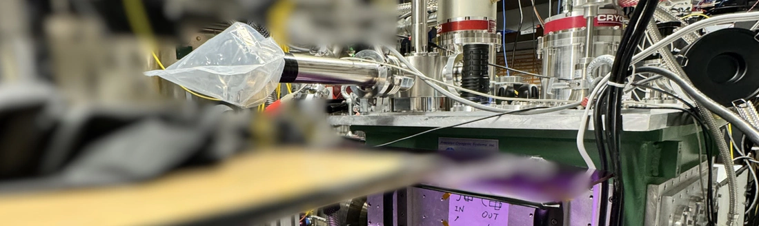 A cryogenic buffer gas beam source with in-situ ablation target replacement